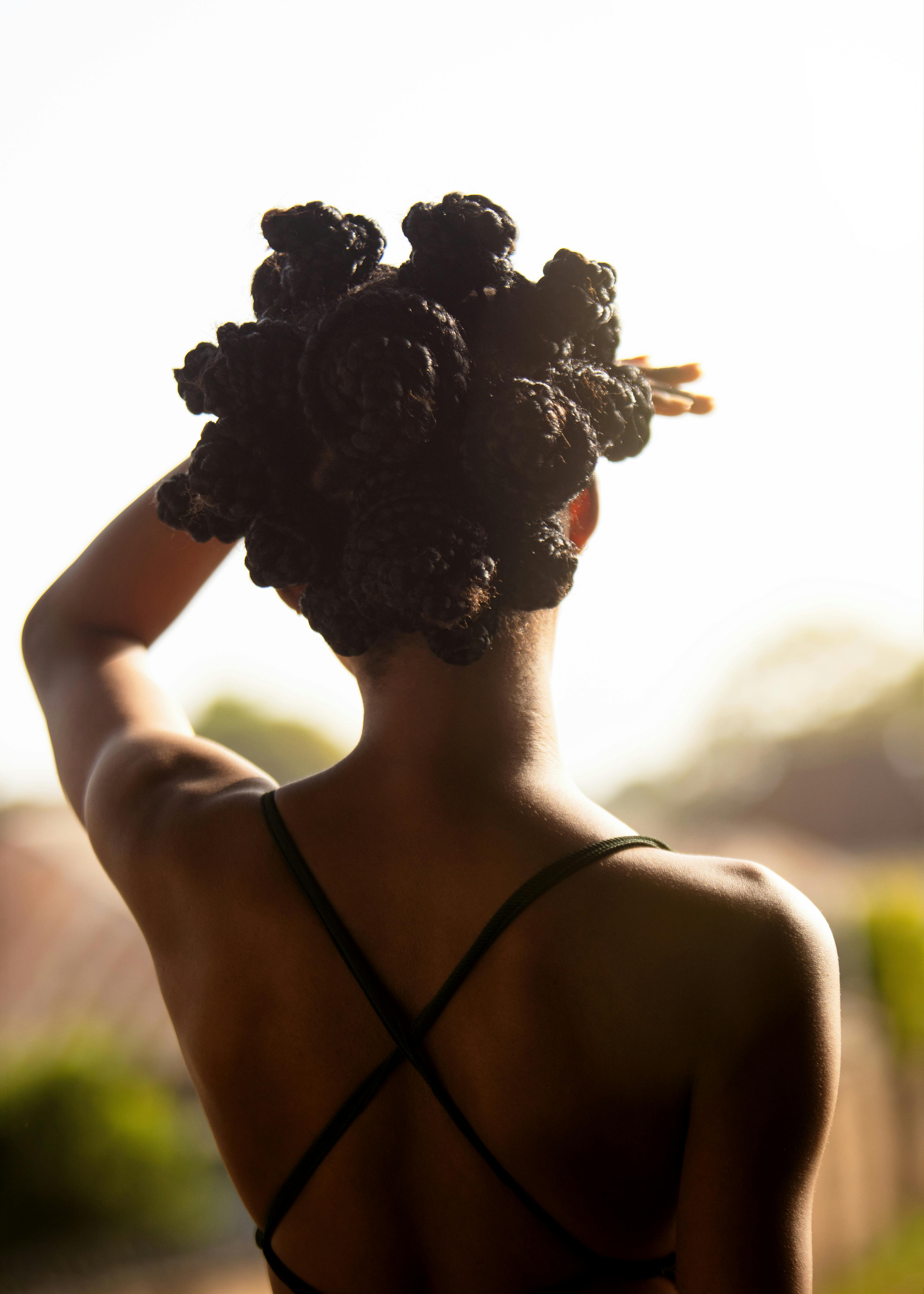 Client with beautifully styled textured hair